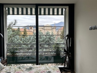 Foto della camera da letto di un appartamento riqualificato