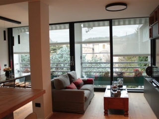 Foto del soggiorno di un appartamento riqualificato